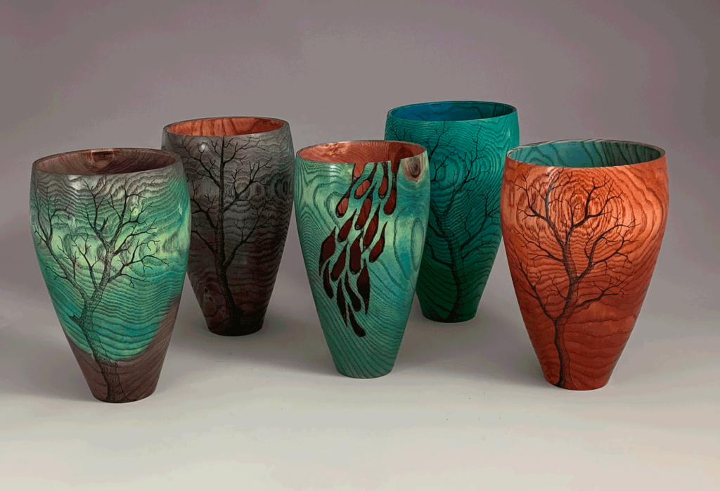 Frank Didomizio - woodturned dyed vases with tree image or carving